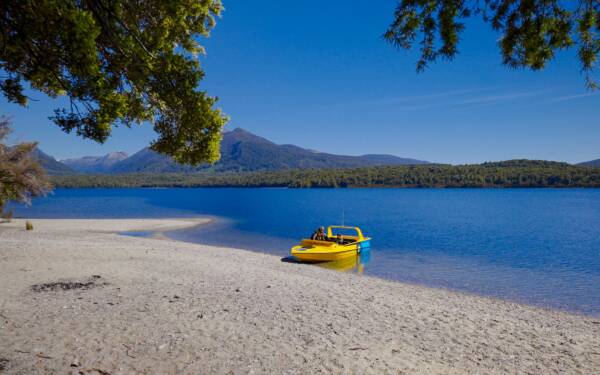 A jet boat in a sandy bay